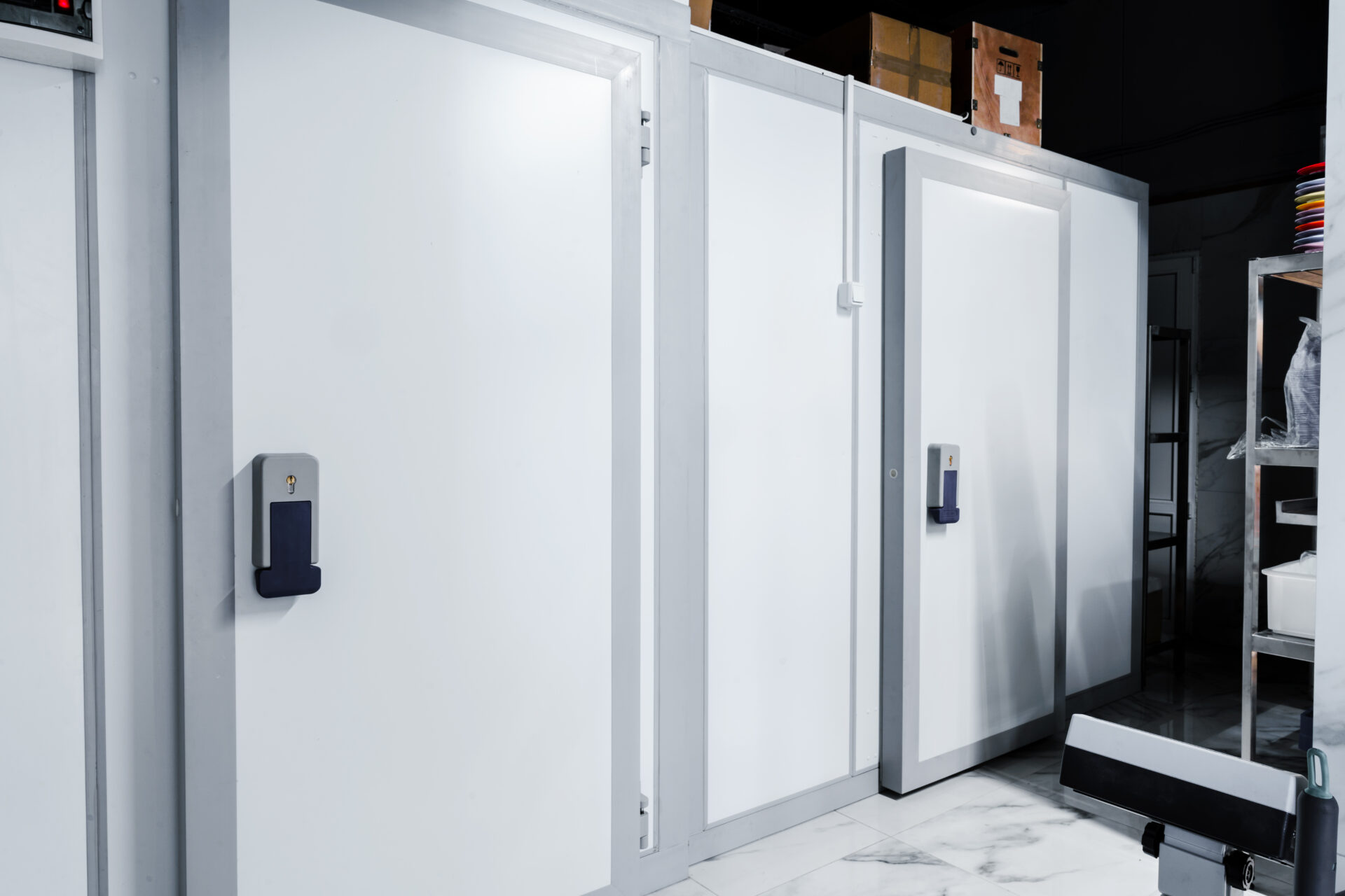 Refrigerator room door in professional kitchen in restaurant close up